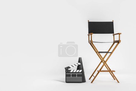 Téléchargez les photos : Film production, director's chair and clapper with megaphone on light background. Concept of cinema. Mockup copy space, 3D rendering - en image libre de droit