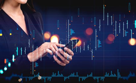 Foto de Businesswoman finger touch phone in hands. Stock market diagrams, forex hologram with candlesticks and lines. Colorful chart with dynamic changes. Concept of online trading. - Imagen libre de derechos