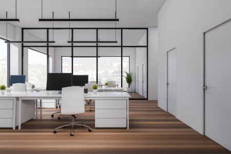 Foto de White coworking interior with armchairs and pc computer on table, hardwood floor. Workspace with panoramic window on countryside. 3D rendering - Imagen libre de derechos