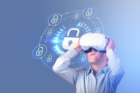 Photo for Child boy in vr headset with digital padlock icons hud, cyber security network and data protection in virtual world. Concept of online safety - Royalty Free Image