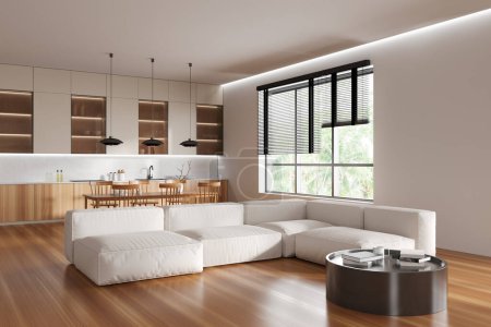 Foto de Luxury studio interior with sofa and coffee table, side view bar island with chairs on hardwood floor. Cooking corner with kitchenware and panoramic window. 3D rendering - Imagen libre de derechos
