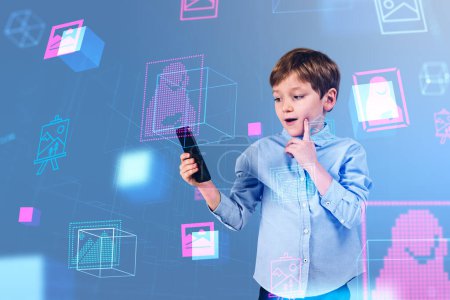 Téléchargez les photos : Excited child boy with phone in hand. Digital hologram with NFT artwork, digital content marketplace for sale. Concept of cryptoart - en image libre de droit