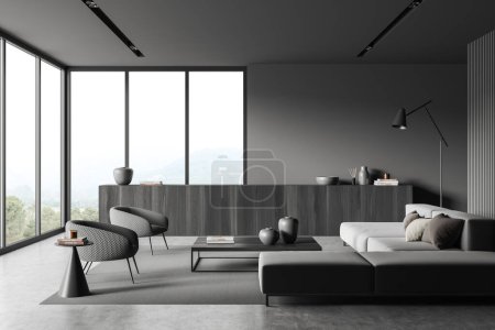 Téléchargez les photos : Dark living room interior with sofa and armchairs, coffee table and commode with decoration, carpet on grey concrete floor. Panoramic window on countryside. 3D rendering - en image libre de droit