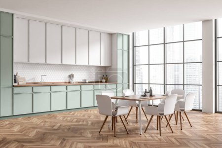 Foto de Light kitchen interior with chairs and dining table, side view, hardwood floor. Kitchenware and dishes on deck. Panoramic window on city view. 3D rendering - Imagen libre de derechos