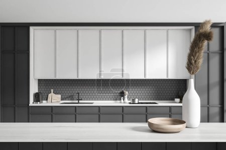 Photo for Front view on dark kitchen room interior with good display for advertisement, cupboard, grey wall, sink, plates, oil, gas cooker. Concept of minimalist design. 3d rendering - Royalty Free Image