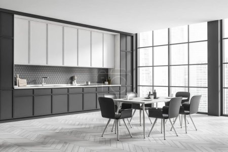 Photo for Dark kitchen interior with chairs and dining table, side view, light grey hardwood floor. Kitchenware and dishes on deck. Panoramic window on city view. 3D rendering - Royalty Free Image