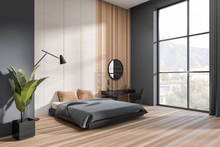 Téléchargez les photos : Stylish hotel studio interior with bed and dressing table, side view, panoramic window on countryside. Plant and lamp on hardwood floor. 3D rendering - en image libre de droit