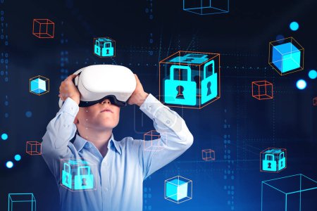 Foto de Child boy in vr glasses, digital cybersecurity hologram with floating blocks and binary. Concept of data protection and children safety - Imagen libre de derechos