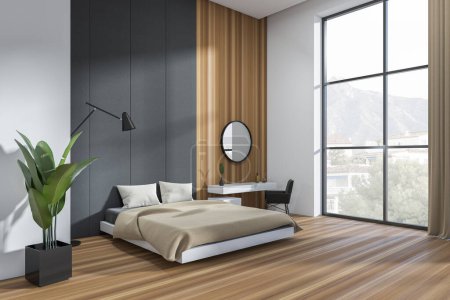 Téléchargez les photos : Modern hotel studio interior with bed and dressing table, side view, panoramic window on countryside. Plant and lamp on hardwood floor. 3D rendering - en image libre de droit