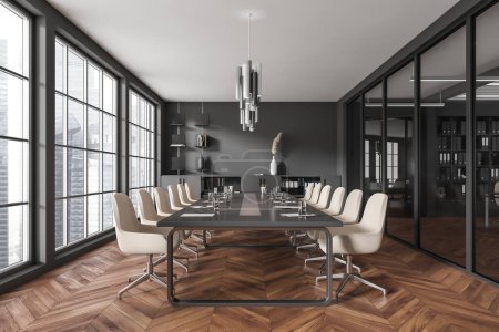 Foto de Dark conference room interior with armchairs and papers on table, hardwood floor. Business meeting room and shelf with documents, panoramic window on Singapore city view. 3D rendering - Imagen libre de derechos
