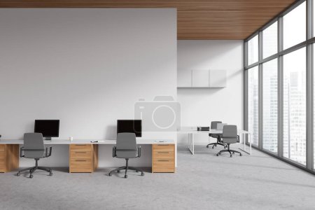 Photo for White office interior with shared table and pc computer. Coworking zone with laptop, consulting area and panoramic window on skyscrapers. Mock up copy space wall. 3D rendering - Royalty Free Image