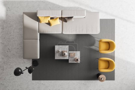 Téléchargez les photos : Vue de dessus de l'espace froid moderne intérieur avec canapé et deux fauteuils, table basse avec décoration, tapis sur sol en béton léger. rendu 3D - en image libre de droit