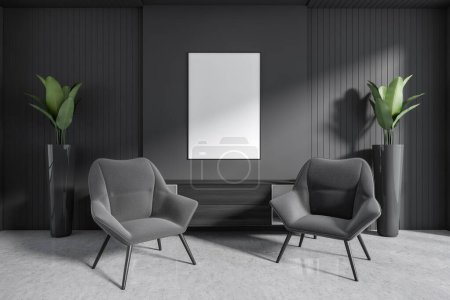 Foto de Interior oscuro relax en oficina de negocios, sillones y aparador con planta, decoración en suelo de hormigón gris. Mock up cartel de lona, representación 3D - Imagen libre de derechos