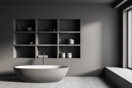 Photo for Dark bathroom interior with bathtub, shelf rack with accessories, grey concrete floor. Washing space in hotel apartment with window. 3D rendering - Royalty Free Image