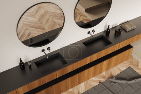Photo for Top view of beige bathroom interior with double sink and two round mirrors, hardwood floor. Modern washbasin in hotel studio with accessories. 3D rendering - Royalty Free Image