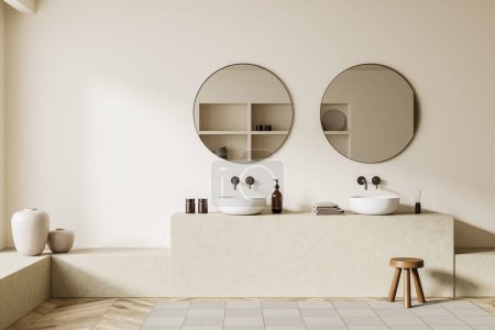 Foto de Beige bathroom interior with double sink and round mirror, stool on carpet, hardwood floor. Hotel bathing accessories and art decoration. 3D rendering - Imagen libre de derechos