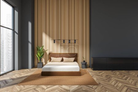 Foto de Interior del dormitorio oscuro con cama y mesita de noche con decoración, vista frontal, vestidor en piso de madera. Ventana panorámica de la ciudad de Singapur. Renderizado 3D - Imagen libre de derechos
