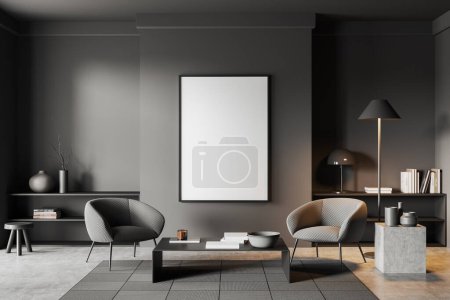 Foto de Interior frío oscuro con dos sillones y decoración de arte minimalista, alfombra en piso de hormigón gris. Lugar de relax con póster de lona maqueta. Renderizado 3D - Imagen libre de derechos