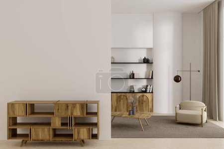 Téléchargez les photos : Interior of minimalistic living room with white walls, concrete floor, comfortable white armchair standing near bookcase and wooden cabinet with mock up wall in the foreground. 3d rendering - en image libre de droit