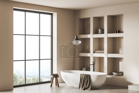 Photo for Corner of modern bathroom with white walls, concrete floor, comfortable white bathtub, shelves for towels and window with blurry mountain view. 3d rendering - Royalty Free Image