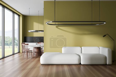 Foto de Moderno estudio interior con sofá, mesa de comedor con asientos en suelo de madera. Zona de cocina con utensilios de cocina y ventana panorámica al campo. Renderizado 3D - Imagen libre de derechos