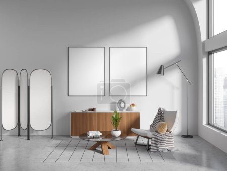 Photo for Interior of modern living room with white walls, concrete floor, cozy white armchair, round coffee table and two vertical mock up posters on wall. Window with blurry cityscape. 3d rendering - Royalty Free Image