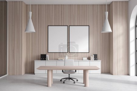 Foto de Interior de la oficina CEO con paredes de madera blanca y clara, mesa de oficina, gabinete de archivo blanco y dos carteles verticales simulados colgando por encima de ella. Concepto publicitario. renderizado 3d - Imagen libre de derechos