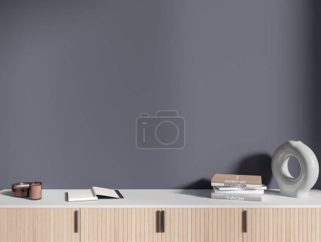 Photo for Front view of white and wooden cabinet with books and vase standing on it in modern room with dark gray walls. Concept of interior design. 3d rendering - Royalty Free Image