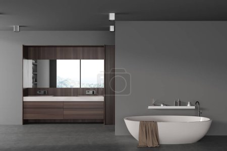 Téléchargez les photos : Moderne intérieur sombre salle de bain de l'hôtel avec baignoire et accessoires, mock up mur vide. Double évier avec commode en bois et miroir. rendu 3D - en image libre de droit