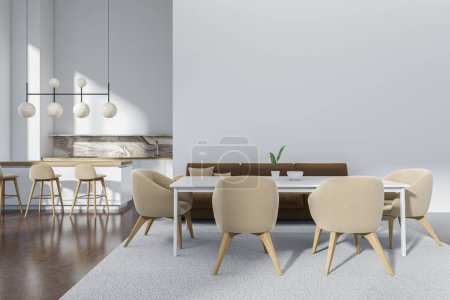 Foto de Interior de la cocina blanca con sofá y mesa de comedor con sillas, espacio de cocina con isla bar y asientos, suelo de hormigón beige. Mockup pared vacía. Renderizado 3D - Imagen libre de derechos