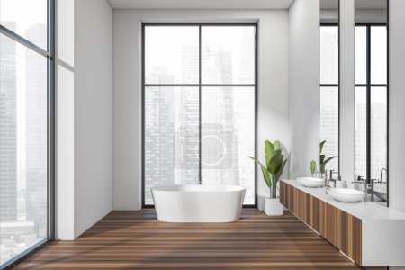 Photo for White bathroom interior with bathtub and double sink with mirror, deck with accessories, plant on hardwood floor. Hotel washing area with panoramic window on Singapore. 3D rendering - Royalty Free Image
