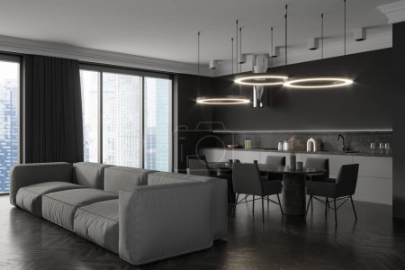 Photo for Dark studio interior with sofa and dining table, side view, panoramic window on Singapore city view. Cooking space with kitchen appliances and chill area, hardwood floor. 3D rendering - Royalty Free Image