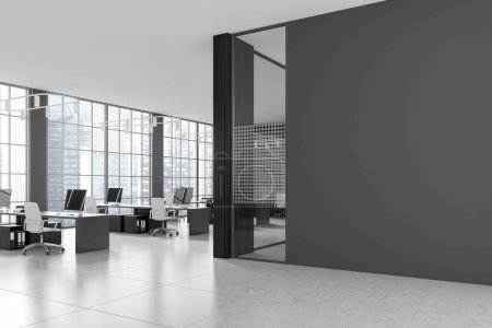 Photo for Corner of stylish office lobby with gray and dark wooden walls, tiled floor and rows of computer tables. Big windows with blurry cityscape. Gray mock up wall. 3d rendering - Royalty Free Image