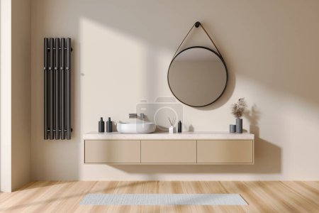 Foto de Interior de baño beige con lavabo y espejo redondo, cajón y toallero en la pared. Accesorios de baño minimalistas y alfombra en suelo de madera. Renderizado 3D - Imagen libre de derechos