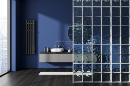 Photo for Modern dark blue bathroom interior with sink behind glass cube partition, panoramic window on skyscrapers. Drawer with bathing accessories and towel rail. 3D rendering - Royalty Free Image