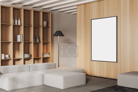 Foto de Acogedor interior de la sala de estar con sofá, estante con vista lateral con una elegante decoración de arte, alfombra en el suelo de madera. Escandinavo relajarse esquina y maqueta de póster de lona. Renderizado 3D - Imagen libre de derechos