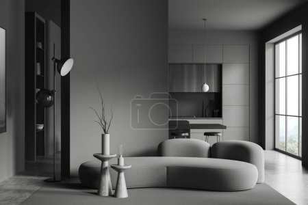 Photo for Interior of stylish living room with gray walls, concrete floor, cozy gray sofa and kitchen with dark wooden cabinets and bar in the background. 3d rendering - Royalty Free Image