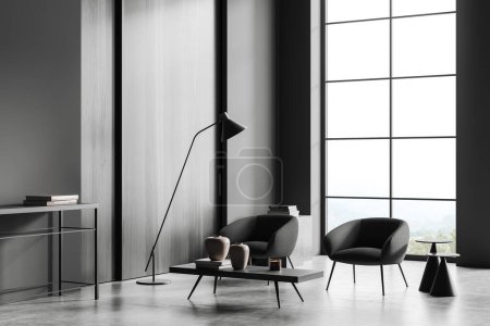 Photo for Dark living room interior with two armchairs, side view, shelf and coffee table with decoration, grey concrete floor. Panoramic window on countryside. 3D rendering - Royalty Free Image