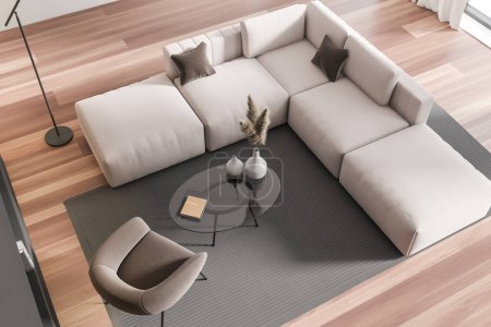 Foto de Vista superior del lugar de relax interior con sofá de esquina y sillón, mesa de centro de vidrio con decoración, alfombra en piso de madera. Renderizado 3D - Imagen libre de derechos
