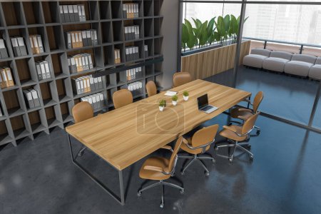 Photo for Top view of dark meeting interior with chairs and board. Conference area and lounge zone, sofa on terrace with plant. Shelf with documents, panoramic view on Singapore. 3D rendering - Royalty Free Image