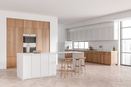 Photo for White kitchen interior with bar chairs and island on hardwood floor, side view, shelf and kitchenware on deck. Panoramic window on Singapore city view. 3D rendering - Royalty Free Image