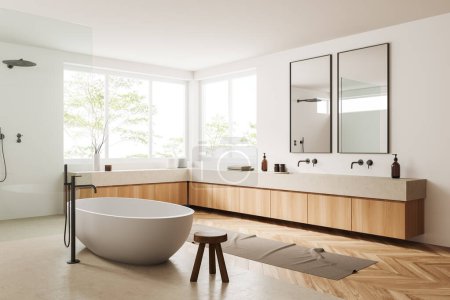 Photo for White bathroom interior with bathtub on hardwood floor. Double sink with mirror, shower and deck with accessories, side view. Panoramic window on tropics. 3D rendering - Royalty Free Image