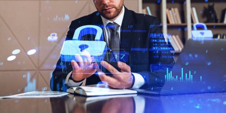 Photo for Unrecognizable businessman using smartphone in blurry office with double exposure of immersive data protection interface. Concept of cybersecurity - Royalty Free Image