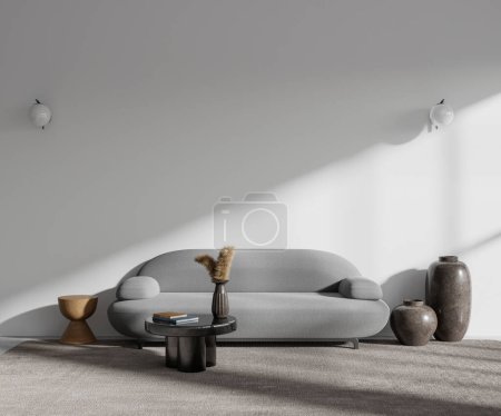 Téléchargez les photos : Intérieur du salon élégant avec murs blancs, tapis gris, canapé gris confortable et table basse ronde. Rendu 3d - en image libre de droit
