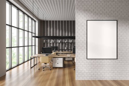 Photo for Interior of stylish open space office with white and white brick walls, wooden floor, rows of computer tables with yellow chairs and vertical mock up poster frame. 3d rendering - Royalty Free Image