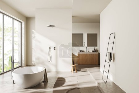 Téléchargez les photos : Intérieur de salle de bain beige avec baignoire au sol en béton clair. Évier avec miroir, douche et échelle porte-serviettes avec accessoires, fenêtre panoramique sur les tropiques. rendu 3D - en image libre de droit