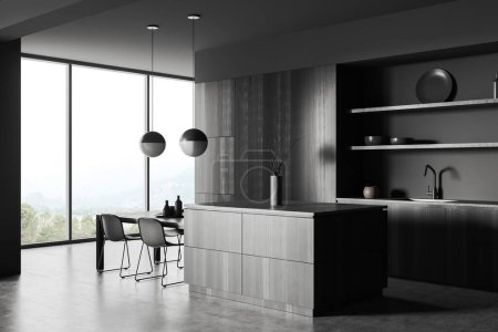Photo for Dark dining interior with island, table and chairs on grey concrete floor, side view, panoramic window on countryside. Minimalist kitchen with eating area and kitchenware. 3D rendering - Royalty Free Image