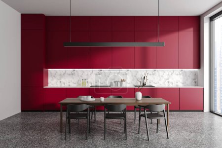 Foto de Moderno interior de la cocina casera con mesa de cena, zona de cocina con estantes rojos ocultos y utensilios de cocina. Ventana panorámica sobre rascacielos. Renderizado 3D - Imagen libre de derechos