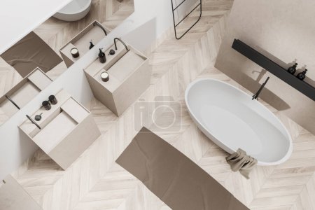 Top view of bathroom interior with bathtub and double sink with accessories, foot towel on hardwood floor. Washing corner in modern hotel studio. 3D rendering