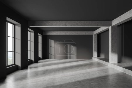Foto de Dark studio interior with grey concrete floor, front view, empty open space apartment with panoramic window on countryside. No furniture, no people. 3D rendering - Imagen libre de derechos
